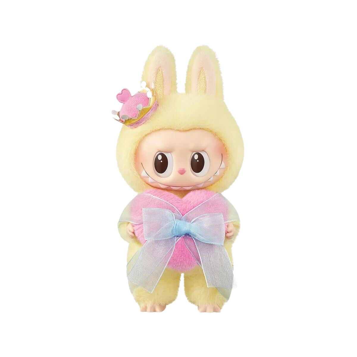 A cute collectible figure from the Pop Mart Labubu series, styled against a plain white background. The character is dressed in a fuzzy yellow bunny costume with tall ears and is holding a plush pink heart wrapped in a sheer, pastel blue ribbon. It wears a tiny pink crown with heart accents on its head, adding a touch of royalty and charm to the figure’s adorable and dreamy appearance.
