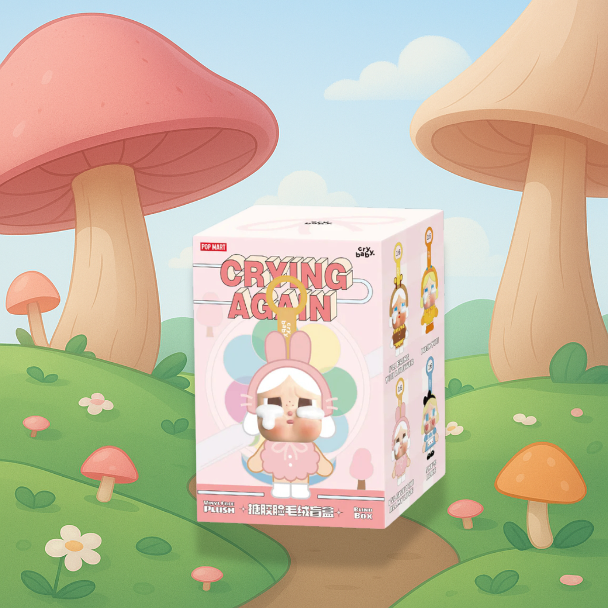 A whimsical product display featuring a Pop Mart Crybaby “Crying Again” blind box. The box shows a teary-eyed character in a pink bunny outfit, set against a pastel background with a colorful pinwheel design. Collectible variants are displayed on the side of the box. The backdrop is a dreamy, cartoon-like forest with oversized mushrooms, soft green hills, and scattered flowers, adding to the magical, storybook atmosphere.