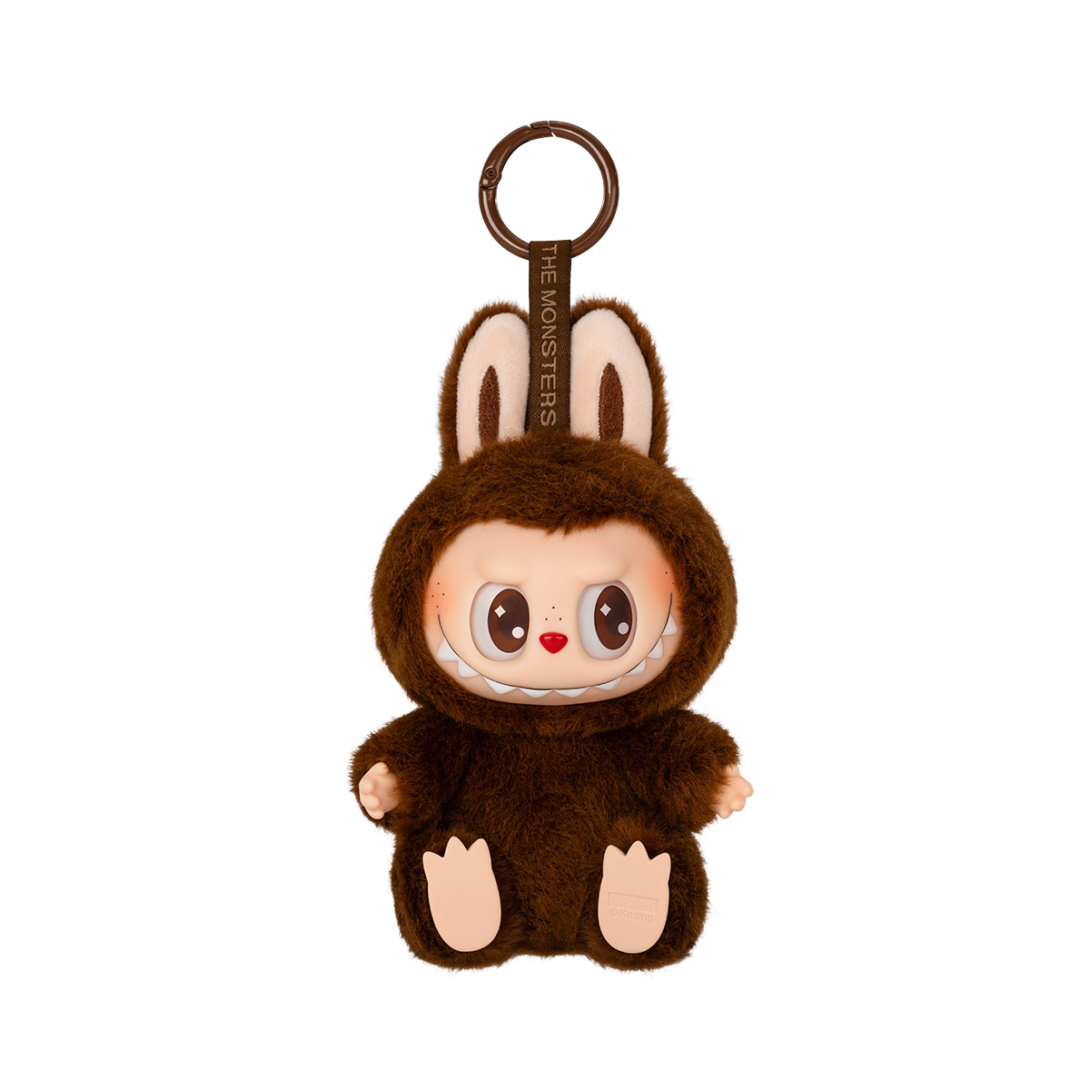 A keychain figure from Pop Mart’s "Have A Seat" Labubu series. The character is dressed in a soft, fluffy dark brown bunny suit with tall ears. It has a mischievous expression with brown eyes closed in a joyful smile and a wide, toothy grin. The keychain loop is attached to the top, and a tag reading “THE MONSTERS” is printed on the strap. The figure sits with its feet visible and has a plush texture for added charm.