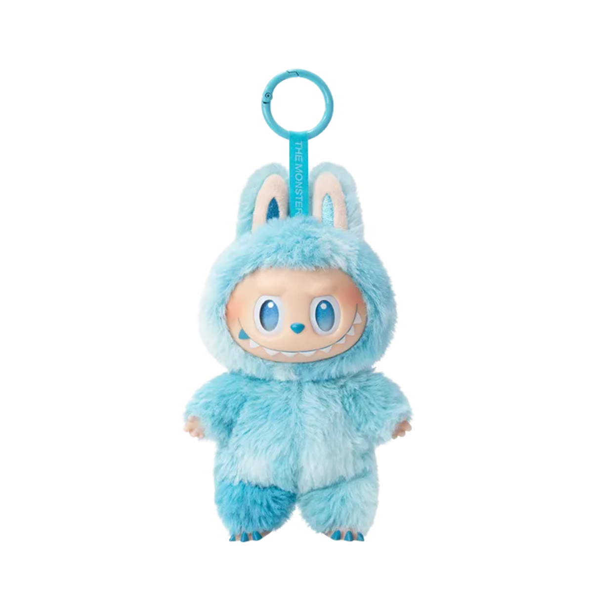 A plush keychain figure from Pop Mart’s “The Monsters” Labubu series. The character is wearing a fuzzy light and dark blue bunny suit with tall ears and a matching pink keychain strap labeled “THE MONSTERS.” It has striking red eyes and a mischievous toothy grin, giving it an energetic and bold appearance. The plush texture and bright color scheme make this figure both cute and fierce, perfect for collectors who enjoy vibrant and expressive designs.