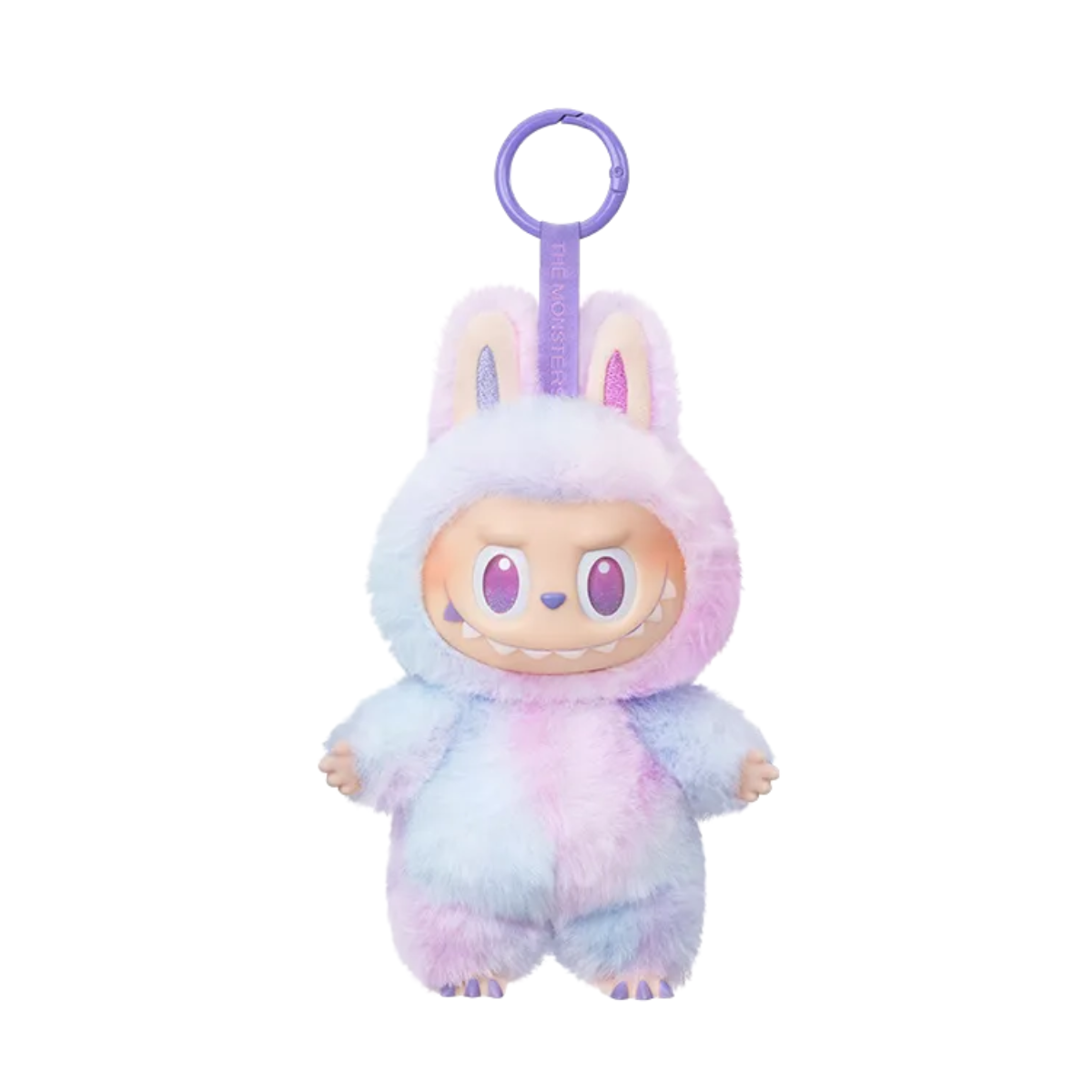 A plush keychain figure from Pop Mart’s “The Monsters” Labubu series. The character is wearing a fuzzy light blue and light purple bunny suit with tall ears and a matching pink keychain strap labeled “THE MONSTERS.” It has striking red eyes and a mischievous toothy grin, giving it an energetic and bold appearance. The plush texture and bright color scheme make this figure both cute and fierce, perfect for collectors who enjoy vibrant and expressive designs.