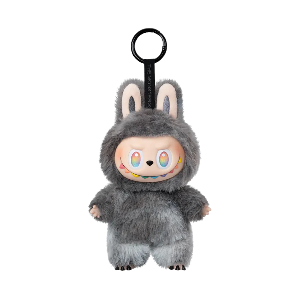 A plush keychain figure from Pop Mart’s “The Monsters” Labubu series. The character is wearing a fuzzy grey and black bunny suit with tall ears and a matching pink keychain strap labeled “THE MONSTERS.” It has striking red eyes and a mischievous toothy grin, giving it an energetic and bold appearance. The plush texture and bright color scheme make this figure both cute and fierce, perfect for collectors who enjoy vibrant and expressive designs.