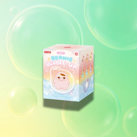 A dreamy product display of the Pop Mart “Pucky Beanie Bubble Up” plush pendant blind box. The pastel-toned box features a cute, round character encased in a bubble, surrounded by soft clouds and sparkles. The packaging showcases other collectible designs on the side. The background is a soft green and yellow gradient with large translucent bubbles, creating a whimsical, floaty atmosphere that complements the bubble theme.